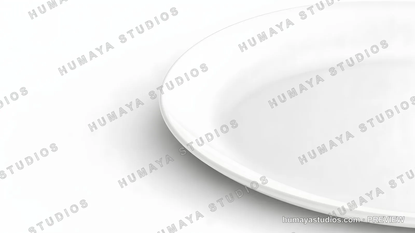 Close-up of a white ceramic plate on a white background