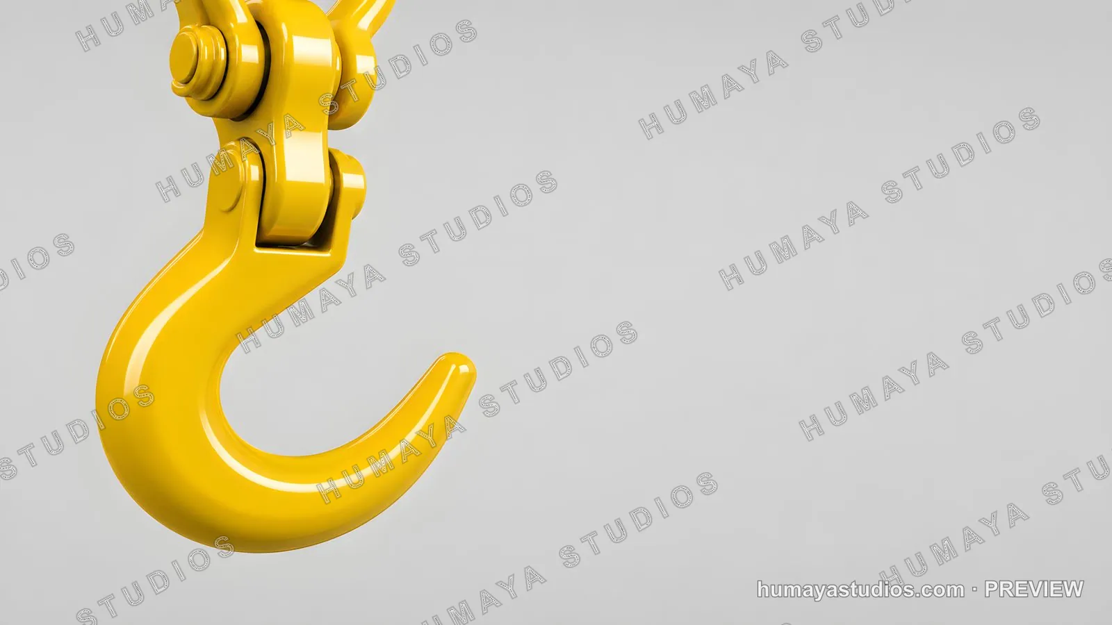 Yellow crane hook on grey background for heavy lifting