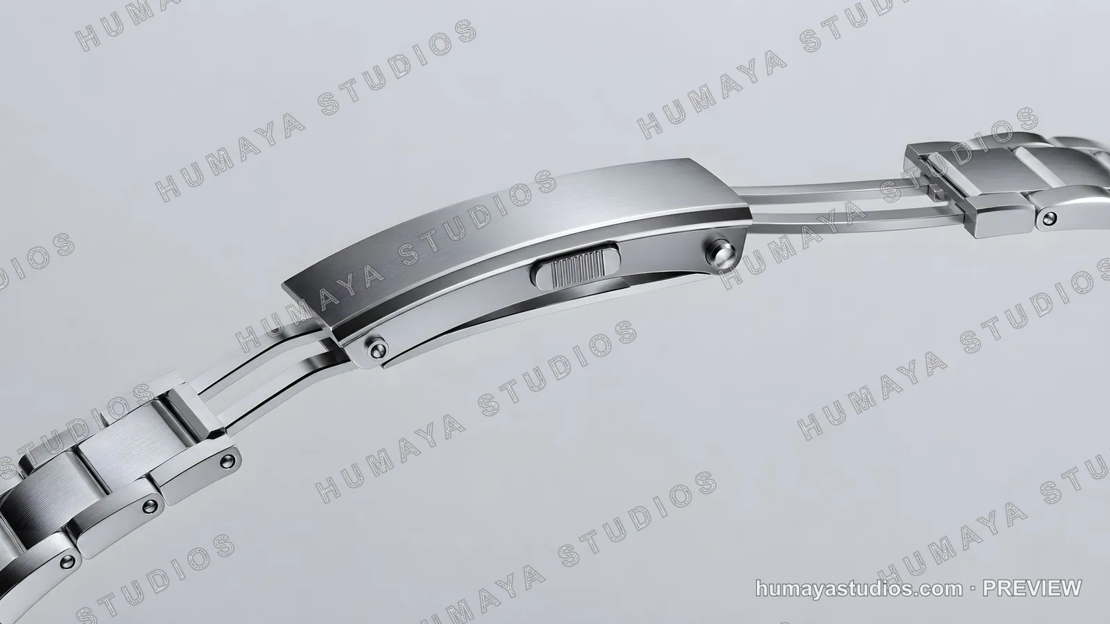 Close-up of a stainless steel watch clasp and bracelet link mechanism