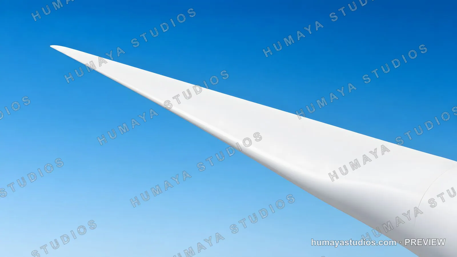 Wind Turbine Blade Tip Against Clear Blue Sky