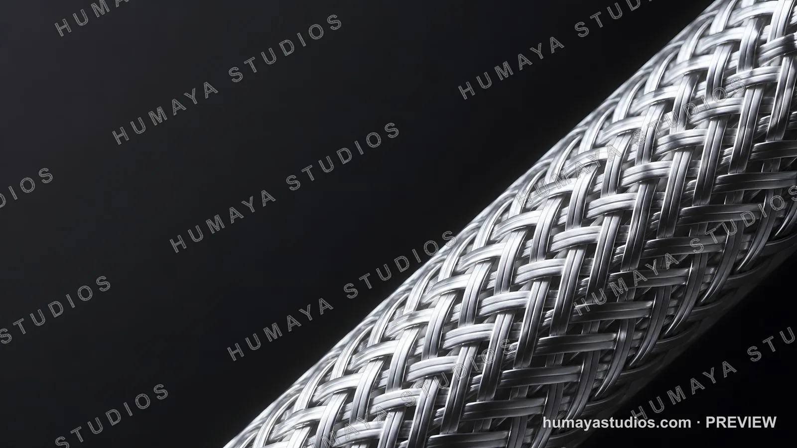Metallic braided hose close-up against dark background