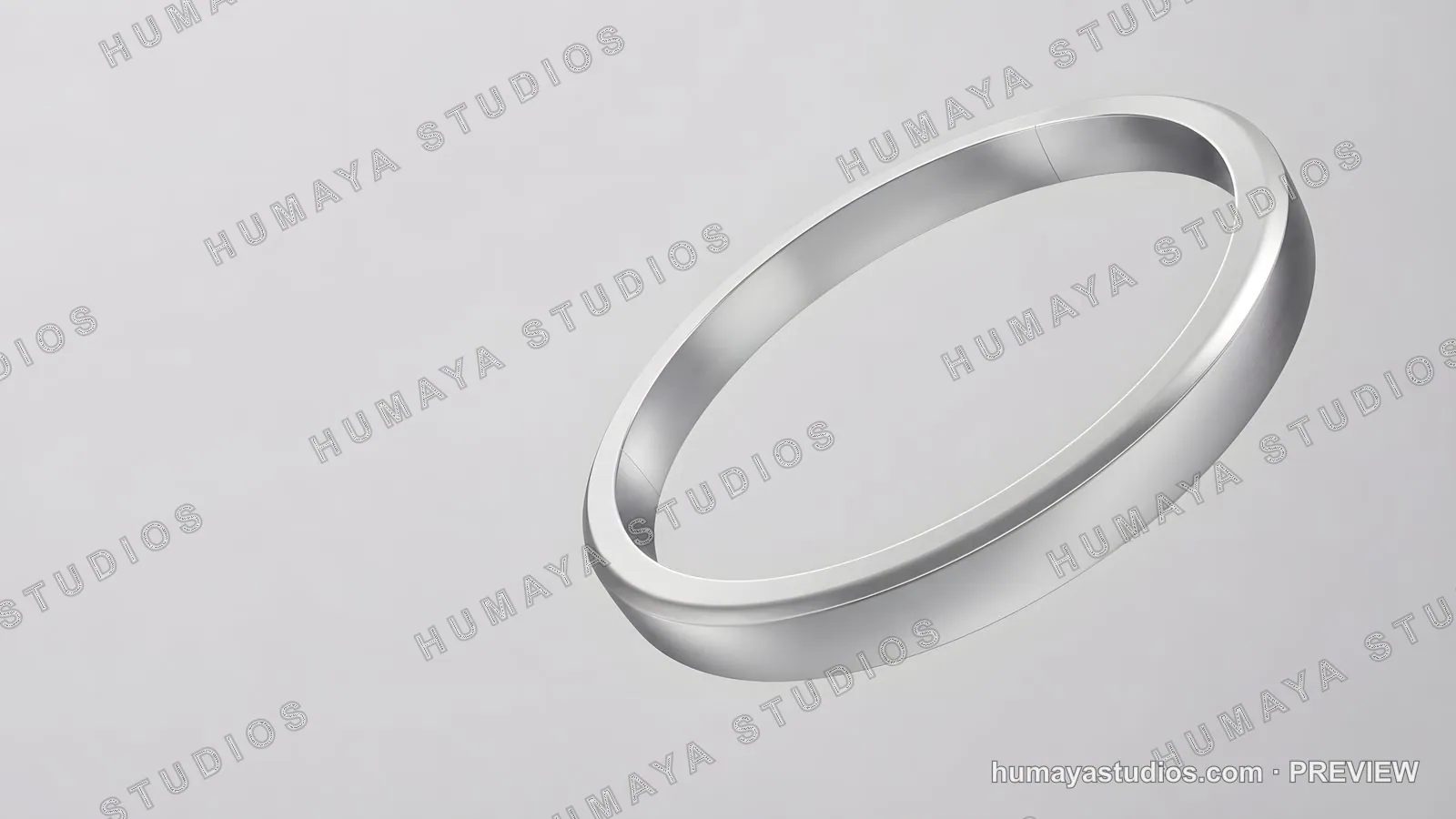 Silver ring floating on a plain grey background