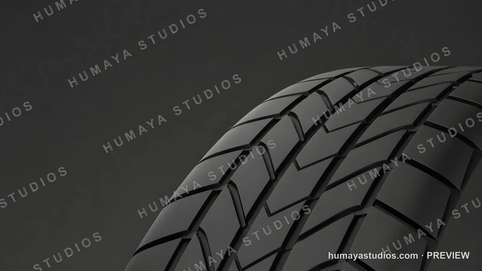 Close up of a black rubber car tire tread against dark background