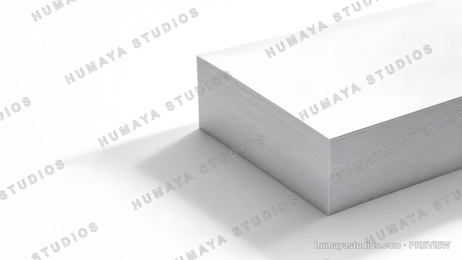 Stack of white paper sheets on a clean surface