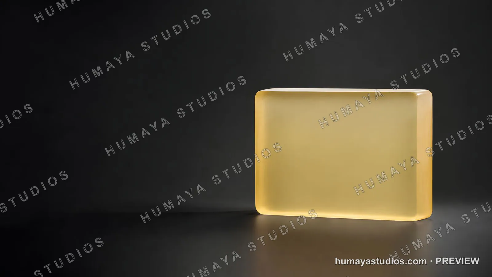 Yellow Transparent Soap Bar on Dark Surface