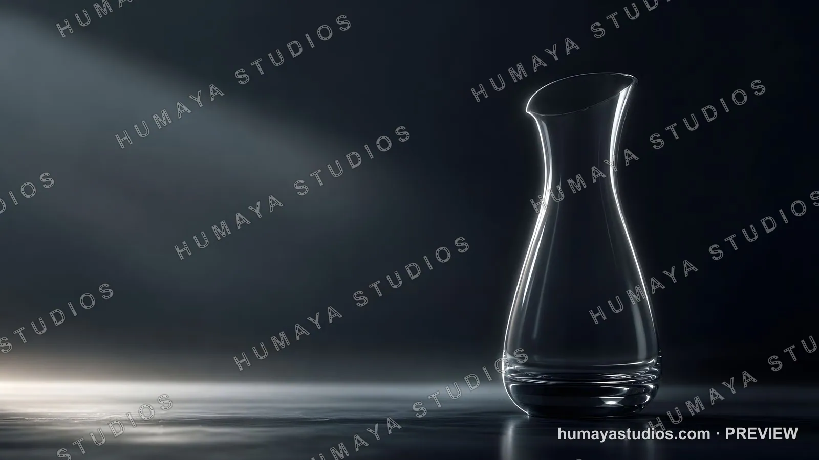 Empty glass carafe on dark surface with spotlight