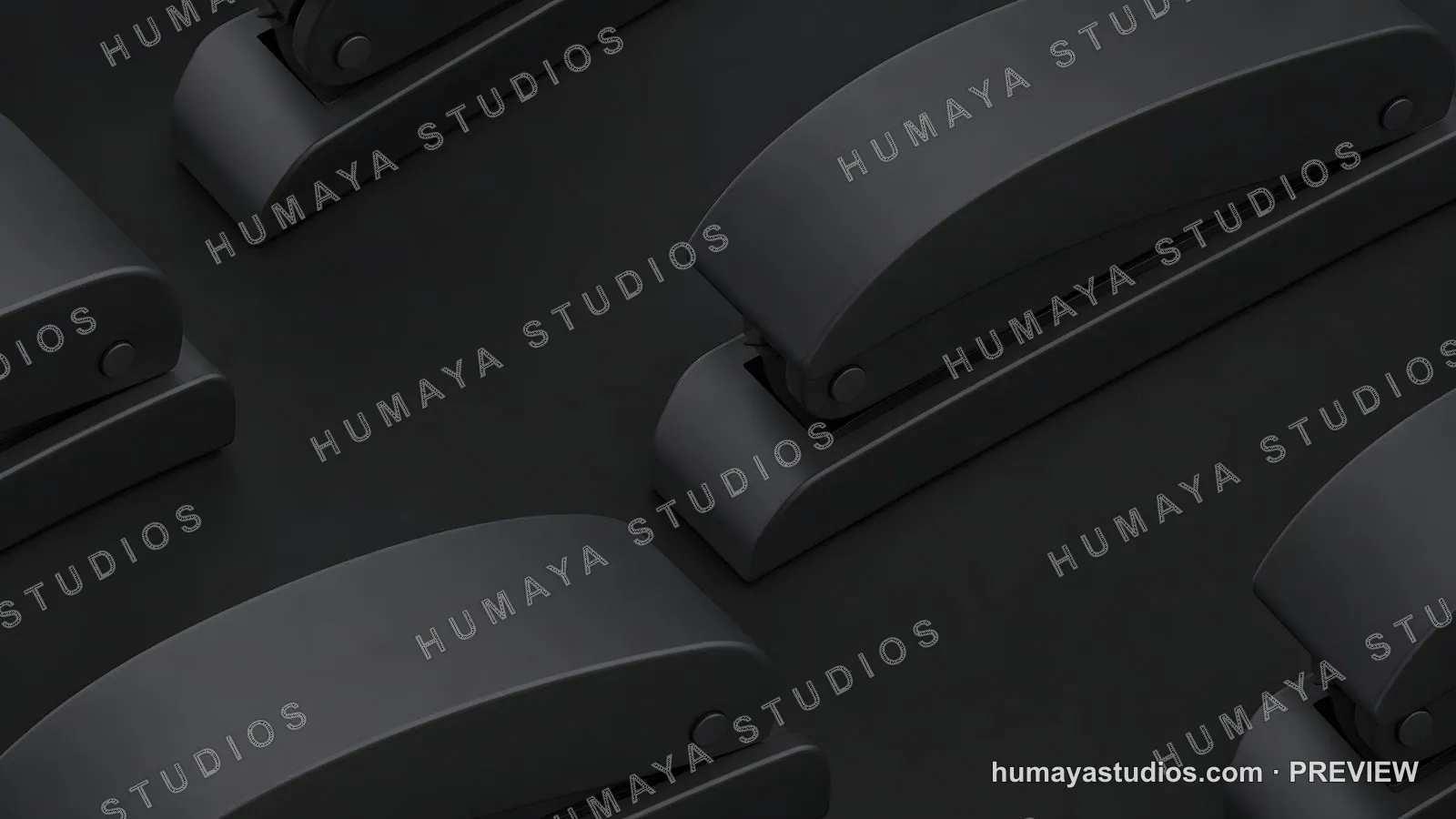 Minimalist Black Staplers Aligned on Dark Surface