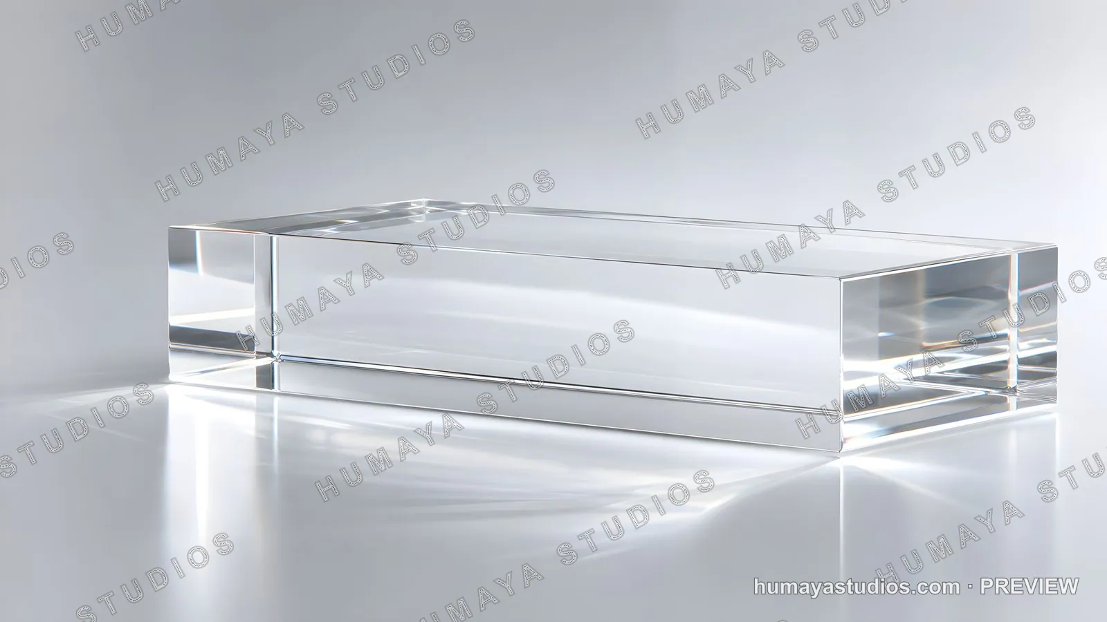 Transparent glass block on clean reflective surface, studio shot