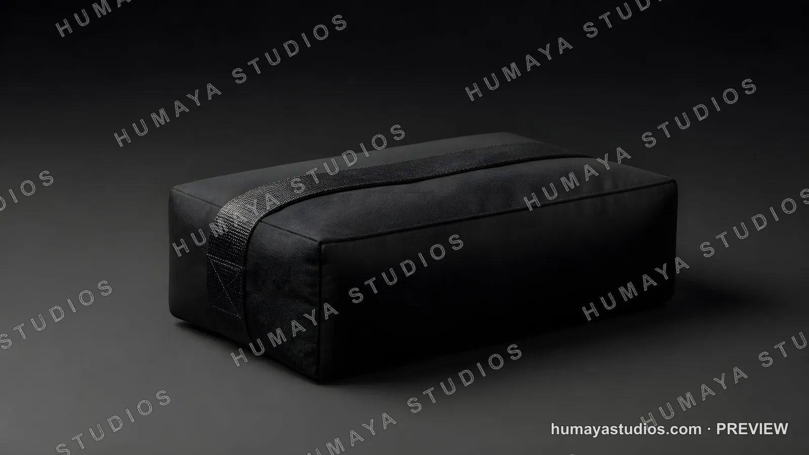 Black rectangular yoga bolster cushion with carrying strap