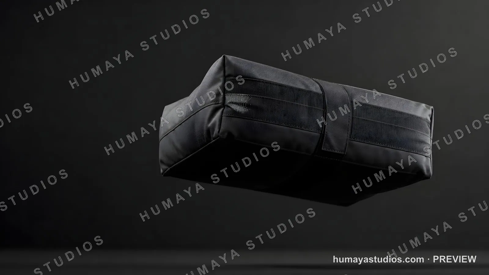 Black packing cube floating against dark background