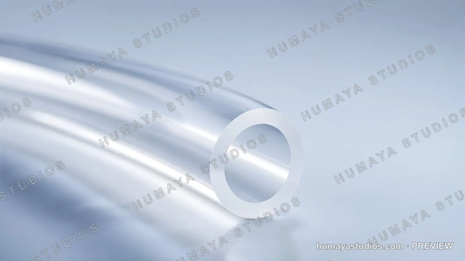 Transparent plastic hose close-up on clean light blue background