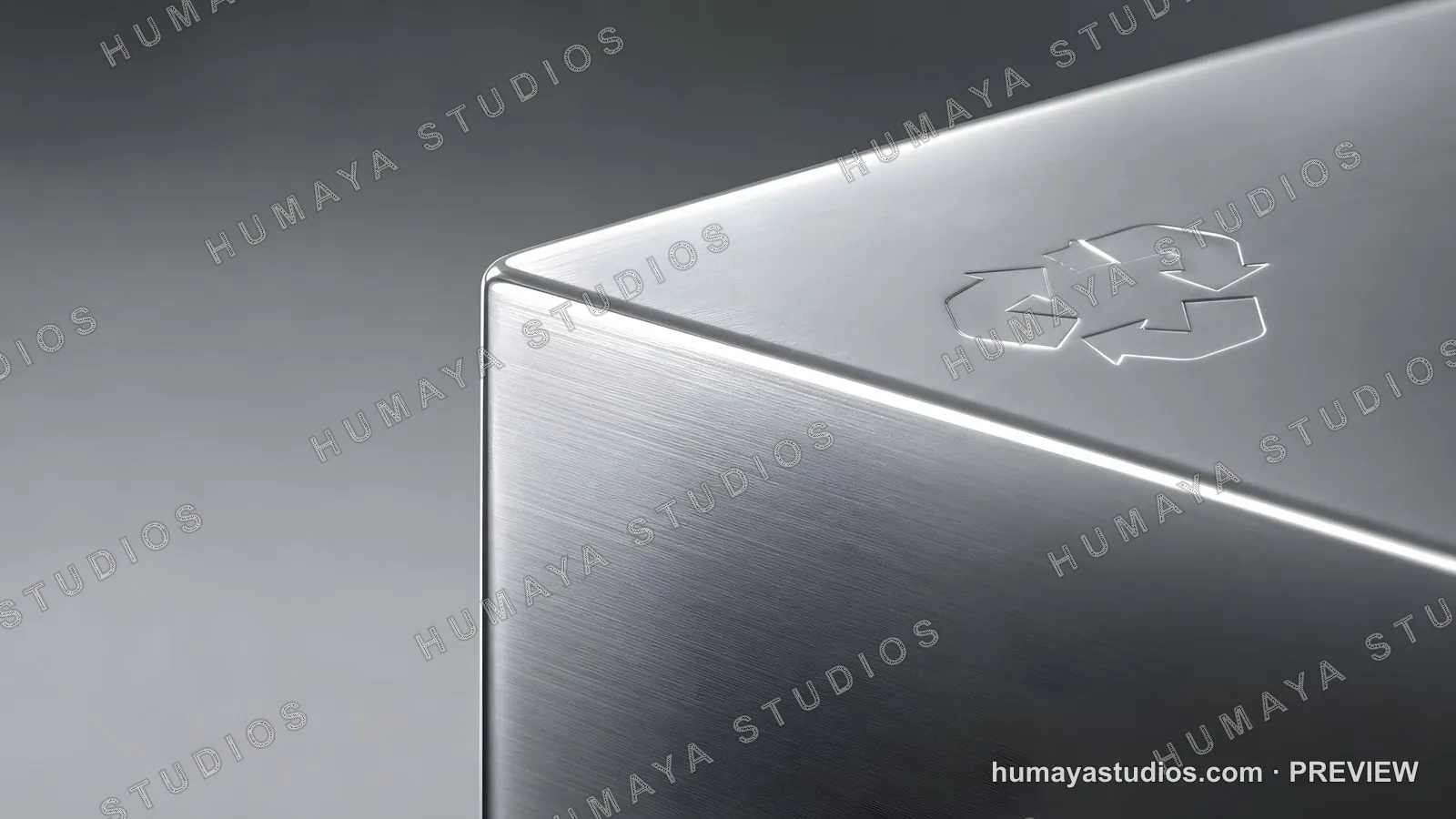 Recycling symbol engraved on brushed stainless steel metal cube