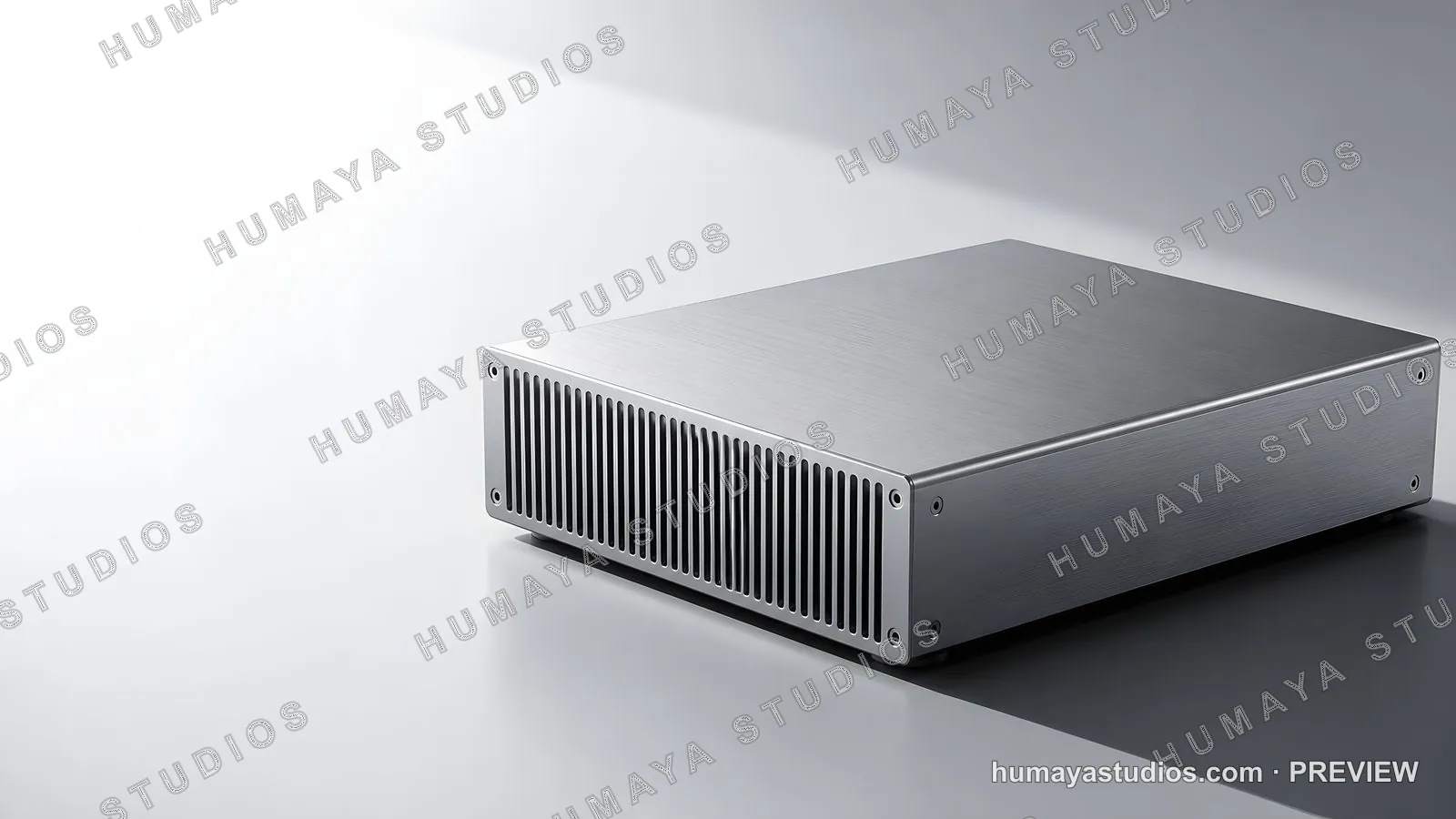 Metallic mini PC enclosure with cooling fins on a gray studio surface