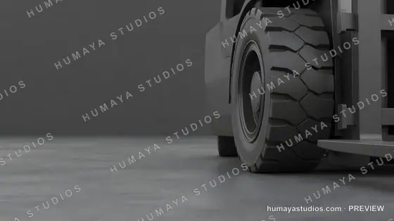 Close up of forklift wheel on concrete floor in warehouse