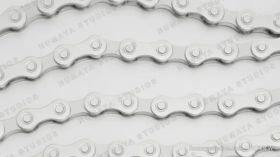 Close-up of shiny bicycle chains on clean white background