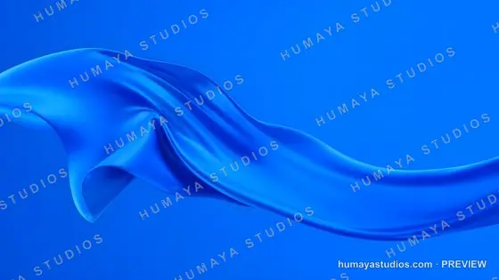 Blue silk fabric wave flowing in the wind against solid background