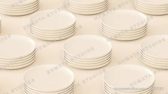 Minimalist stacks of white ceramic plates arranged in geometric grid