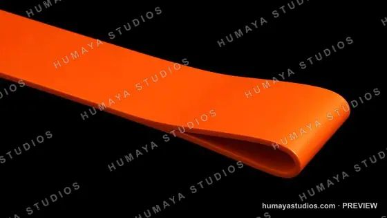 Orange exercise resistance band looped on black background