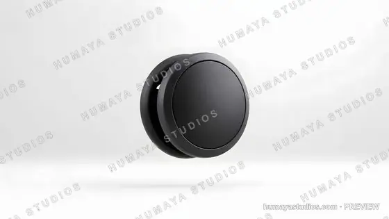Modern Black Yo-Yo Floating on White Background Studio Shot
