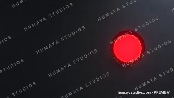 Glowing Red Button on Dark Metallic Surface