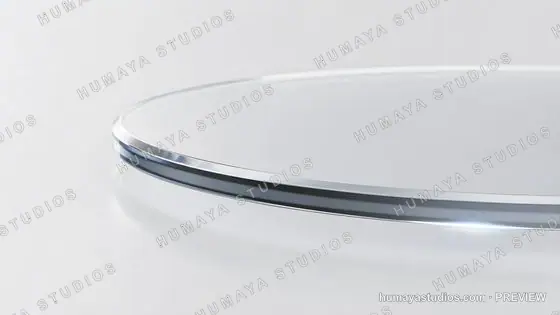 Transparent glass lens profile close up on bright studio background