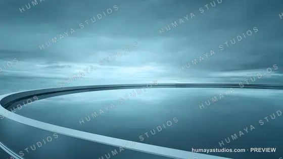 Futuristic circular platform with calm water reflecting cloudy sky