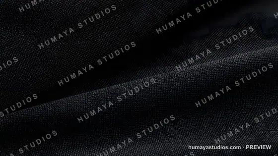 Black fabric texture with folds and shadows