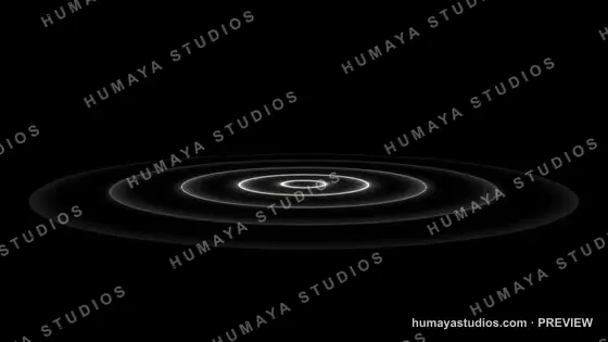 Glowing white concentric rings rippling on dark surface